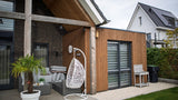 Moderne nieuwbouwwoning met houten aanbouw-Prowood-donker-metselwerk,eigentijdse-woning,Exterieur,gevelbekleding-hout,houten-aanbouw,houten-overkapping,moderne-architectuur,moderne-woning,nieuwbouwwoning,strak-ontwerp,wit-stucwerk-Moderne woning met houten aanbouw en garage-OBLY