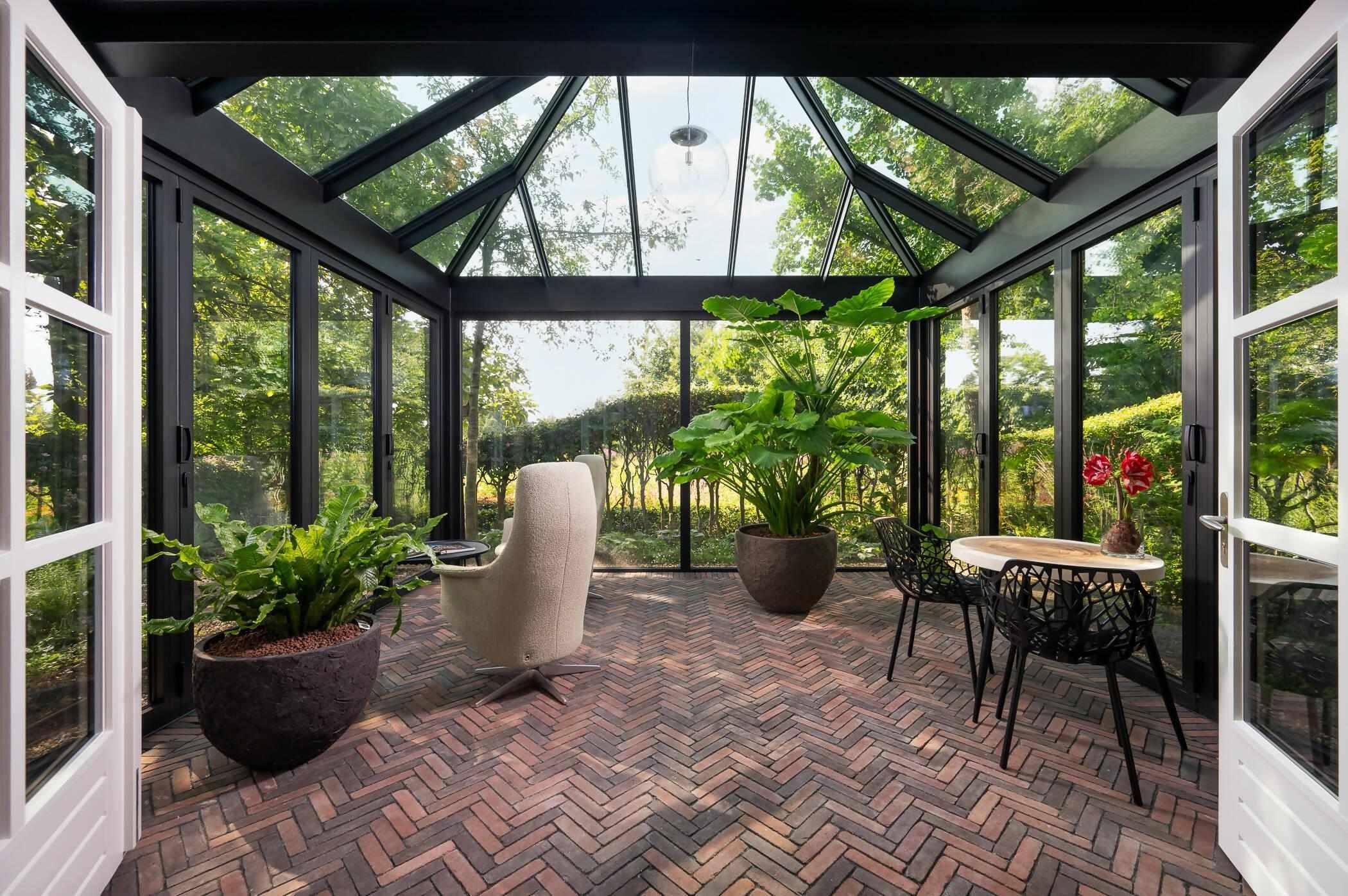 Moderne orangerie-Busscher Serrebouw-Aanbouw,glazen orangerie,moderne orangerie,orangerie aanbouw,orangerie met staal,tuinorangerie-Moderne orangerie-OBLY