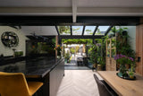 Moderne serre met glazen dak-Solarlux Nederland BV-aluminium serre,glazen serre,moderne serre,serre aanbouw,serre met glazen dak-Moderne serre met glazen dak en aluminium kozijnen-OBLY