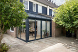 Moderne serre met glazen dak-Solarlux Nederland BV-aluminium serre,glazen serre,moderne serre,serre aanbouw,serre met glazen dak-Moderne serre met glazen dak en aluminium kozijnen-OBLY