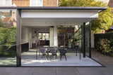 Moderne woning in Den Haag met glazen uitbouw-KELLER minimal windows® by Kumasol-aluminium kozijnen,binnen buiten verbinding,Exterieur,glazen uitbouw,luxe woning,moderne villa den haag,open leefruimte,strakke architectuur,veel daglicht,villa renovatie-Glazen uitbouw woning Den Haag | KELLER minimal windows-OBLY