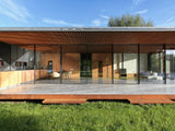 Moderne woning in Hilversum met grote glazen gevels-KELLER minimal windows® by Kumasol-aluminium kozijnen,binnen buiten verbinding,Exterieur,Glasspecialist,glazen gevel,luxe woning,moderne villa hilversum,open leefruimte,strakke architectuur,veel daglicht,villa aan het water-Moderne woning Hilversum met glazen gevel | KELLER-OBLY