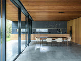 Moderne woning in Hilversum met grote glazen gevels-KELLER minimal windows® by Kumasol-aluminium kozijnen,binnen buiten verbinding,Exterieur,Glasspecialist,glazen gevel,luxe woning,moderne villa hilversum,open leefruimte,strakke architectuur,veel daglicht,villa aan het water-Moderne woning Hilversum met glazen gevel | KELLER-OBLY