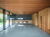 Moderne woning in Hilversum met grote glazen gevels-KELLER minimal windows® by Kumasol-aluminium kozijnen,binnen buiten verbinding,Exterieur,Glasspecialist,glazen gevel,luxe woning,moderne villa hilversum,open leefruimte,strakke architectuur,veel daglicht,villa aan het water-Moderne woning Hilversum met glazen gevel | KELLER-OBLY