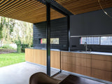 Moderne woning in Hilversum met grote glazen gevels-KELLER minimal windows® by Kumasol-aluminium kozijnen,binnen buiten verbinding,Exterieur,Glasspecialist,glazen gevel,luxe woning,moderne villa hilversum,open leefruimte,strakke architectuur,veel daglicht,villa aan het water-Moderne woning Hilversum met glazen gevel | KELLER-OBLY