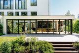 Moderne woning met glazen vouwwand-Solarlux Nederland BV-aluminium vouwwand,glazen vouwwand,moderne woning,open leefruimte,vouwwand terras-Moderne woning met glazen vouwwand naar terras-OBLY
