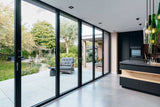 Moderne woning met grote schuifpui-Solarlux Nederland BV-grote schuifpui,moderne uitbouw,moderne woning,open leefruimte,schuifpui tuin-Moderne woning met grote schuifpui naar de tuin-OBLY