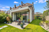 Monument met wit metselwerk in de aanbouw-JAREN 30 ARCHITECT-Aanbouw,Eetkamer,Exterieur,Keuken,Slaapkamer-OBLY