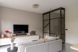 Multifunctionele loung & werkruimte-MIND interieur architectuur-interieur met stalen deuren,loungruimte interieur,luxe kitchenette,luxe thuiswerkplek,maatwerk kastwand,maatwerk meubelwand,maatwerk werkruimte,modern souterrain,multifunctioneel interieur,souterrain interieur,stalen schuifdeuren,thuiswerkplek inspiratie,Woonkamer,zit sta bureau-Multifunctionele loung & werkruimte-OBLY