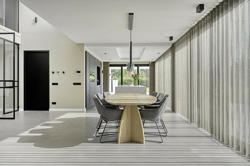 Naadloze gietvloer als basis voor modern wooncomfort-Berkers Vloeren-woonkamer-Naadloze gietvloer in modern interieur – strak, stijlvol en onderhouds-OBLY