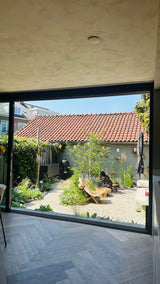 Natuurlijke stadstuin met organische beplanting-The Green Fix-biodiverse tuin,duurzame tuin,grindpad tuin,groene tuin,natuurlijke beplanting,natuurlijke stadstuin,onderhoudsvriendelijke tuin,organische tuin,siergrassen,stadstuin,staptegels tuin,The Green Fix,vaste planten-Natuurlijke stadstuin met organische beplanting | The Green Fix-OBLY