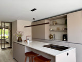 Project Limmen-Lifs Interior Design-achterpui met glaswand,bronzen stalen deur,cinewall met akoestische panelen,Keuken,leefkeuken,maatwerk eetkamerbank,open woonkamer,stijlvolle renovatie,warm modern interieur-Warm modern interieur met leefkeuken en cinewall-OBLY