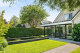 Ruime serreaanbouw met brede vouwwand-Busscher Serrebouw-Aanbouw,Uitbouw-Ruime serreaanbouw met brede vouwwand-OBLY