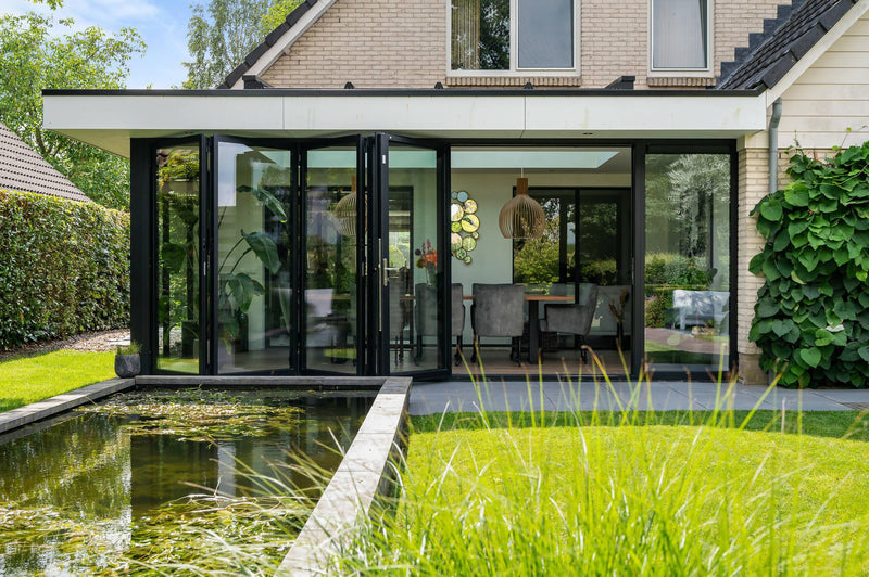 Ruime serreaanbouw met brede vouwwand-Busscher Serrebouw-Aanbouw,Uitbouw-Ruime serreaanbouw met brede vouwwand-OBLY