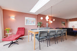 Slimme maatwerkoplossingen in een moderne gezinswoning-oker&goud-boekenkast op maat,kleur- en materiaaladvies,modern interieur,moderne woning,open leefruimte,terrazzo,trapmeubel,woonkeuken-Moderne gezinswoning met maatwerk interieur | OKER&GOUD-OBLY