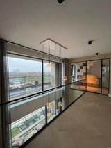 Stijlvol maatwerk glazen vide-Overveld Glas-glazen scheidingswand,glazen schuifwand,glazen wand woonkamer,Glazenwand,moderne woonkamer glas,woonkamer met glaswand-OBLY