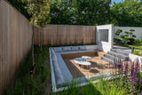 Strakke tuin met maatwerk zitkuil en Millboard-vlonder