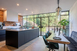 Verbouwing met aanbouw in Hillegersberg-Sensbouw-Luxe keuken design,Stalen puien interieur,Veel daglicht woning,Visgraat vloer interieur,Woonkamer met tuin verbinding-Verbouwing met moderne aanbouw-OBLY