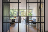 Verbouwing met aanbouw in Hillegersberg-Sensbouw-Luxe keuken design,Stalen puien interieur,Veel daglicht woning,Visgraat vloer interieur,Woonkamer met tuin verbinding-Verbouwing met moderne aanbouw-OBLY