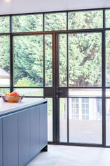 Verbouwing met aanbouw in Hillegersberg-Sensbouw-Luxe keuken design,Stalen puien interieur,Veel daglicht woning,Visgraat vloer interieur,Woonkamer met tuin verbinding-Verbouwing met moderne aanbouw-OBLY