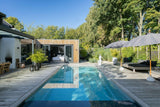 Villa met zwembad-Bureau Kemps Architecten-woonkamer-Radicale herinrichting met zwembad als dagelijks middelpunt-OBLY