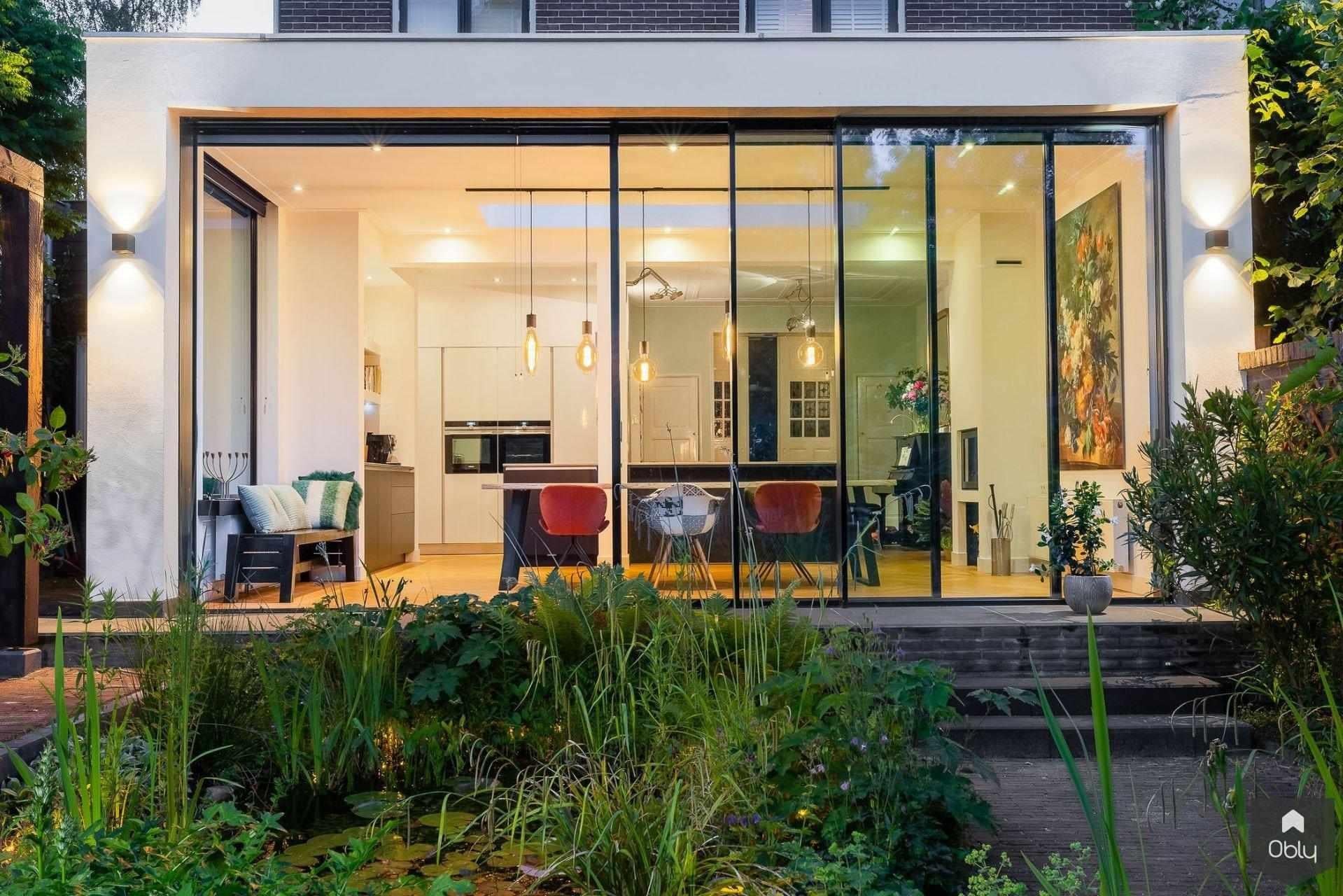 Aanbouw met CERO schuifsysteem-Busscher Serrebouw-Aanbouw,aanbouw met schuifpui,aanbouw woning,alle,glazen uitbouw,moderne aanbouw,uitbouw woonkamer tuin-OBLY