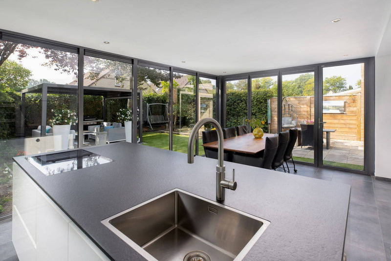Aanbouw met glazen vouwwand-Busscher Serrebouw-Aanbouw,alle,Tuinen,Woonkamer-Aanbouw met glazen vouwwand | OBLY.com-OBLY