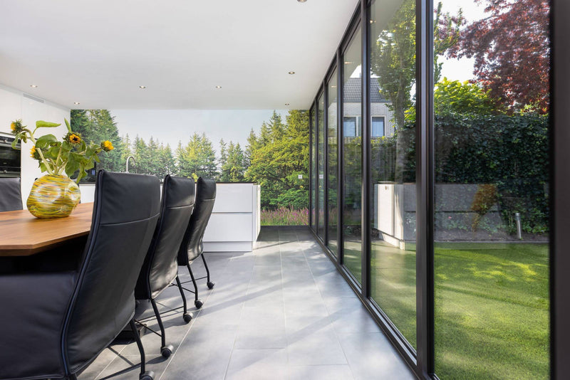 Aanbouw met glazen vouwwand-Busscher Serrebouw-Aanbouw,alle,Tuinen,Woonkamer-Aanbouw met glazen vouwwand | OBLY.com-OBLY