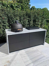 Design buitenkeuken natuurstenen werkblad-COOXS-alle,buiten koken in luxe tuin,buitenkeuken met natuurstenen werkblad,compacte buitenkeuken met barbecue,design buitenkeuken,exclusieve buitenruimte,luxe tuin met buitenkeuken,moderne buitenkeuken inspiratie,strakke wellness tuin-Design buitenkeuken natuurstenen werkblad-OBLY