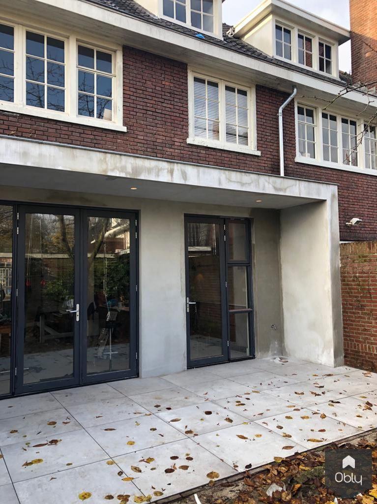 Doorkijkhaard in jaren 30 woning-Van der Pluijm Haard & Schouw-Woonkamer-Doorkijkhaard in jaren 30 woning-OBLY