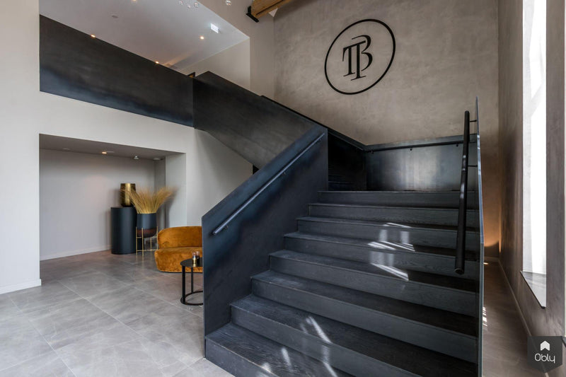 Elegante eiken en stalen trap-Van Bruchem Staircases-alle,Entree hal trap-OBLY