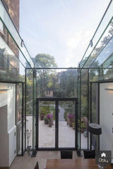Glazen aanbouw aan herenhuis met stalen kozijnen-HOYT Architecten & Bouwmanagers-Aanbouw,aanbouw jaren 30 woning,alle,glazen aanbouw herenhuis,glazen pui aanbouw,glazen serre aanbouw,glazen uitbouw woning,herenhuis,jaren 30 woning,moderne glazen aanbouw,stalen kozijnen uitbouw-Glazen aanbouw herenhuis met stalen kozijnen | HOYT-OBLY