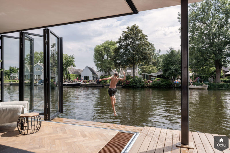 Glazen vouwwanden op een moderne woonboot-Solarlux Nederland BV-alle,Woonkamer-OBLY