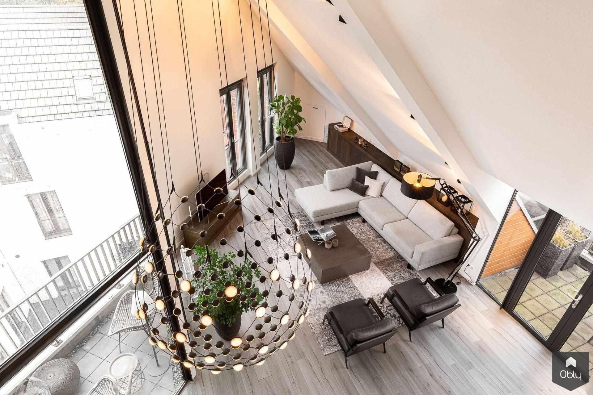 Interieurontwerp en realisatie Penthouse-Studio MBC Interieurontwerp-alle,design verlichting,maatwerkkast,modern interieur,penthouse interieur,warm interieur,Woonkamer-OBLY