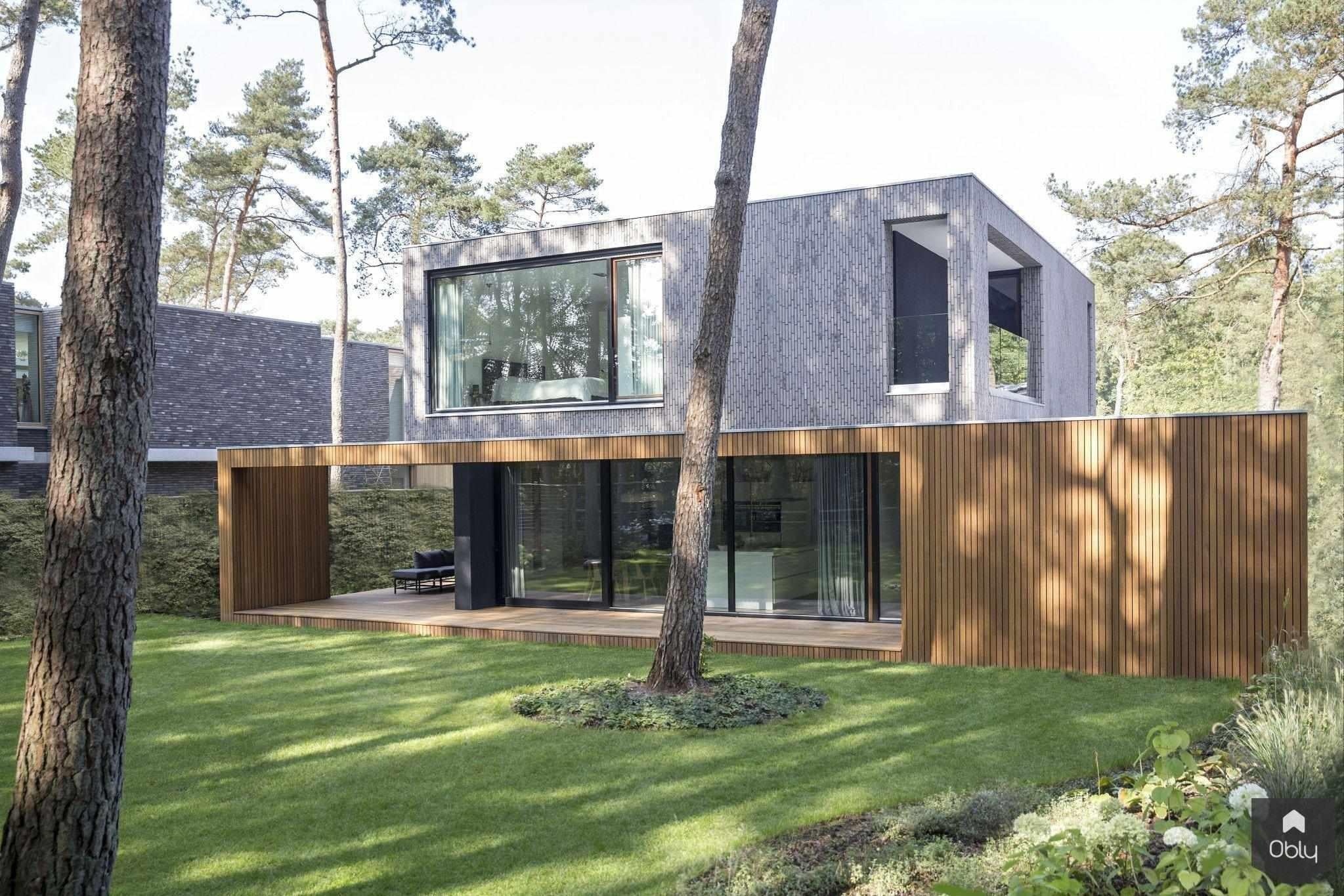 Moderne nieuwbouw villa-Kraal architecten-alle,bosrijke omgeving,Exterieur vrijstaand,houten gevelbekleding,moderne architectuur,moderne villa,nieuwbouw villa,vrijstaande woning,Woonkamer-OBLY