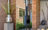 Moderne tuin met beton-look overkapping-Stoop Tuinen-alle,Tuinen-OBLY