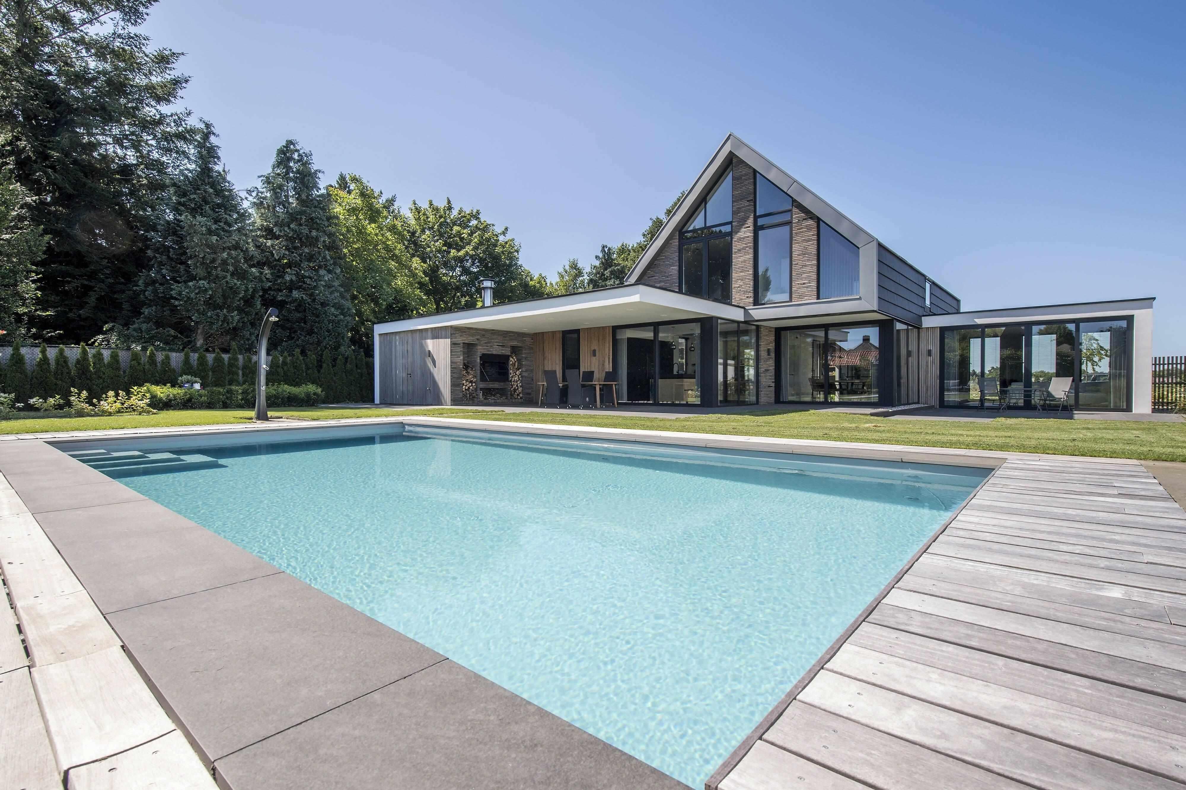 Moderne villa met veel licht-Spanjers Architect-grote raampartijen,minimalistische architectuur,moderne villa,nieuwbouw,open wonen,veel licht,Woonkamer-OBLY