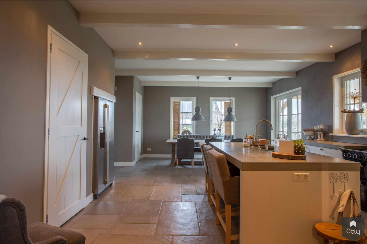 Moderne woning met Chateau Carreau vloeren-Van den Heuvel & Van Duuren-alle,Keuken,keuken met natuursteen vloer,open keuken woonkamer,warme keuken inrichting-OBLY