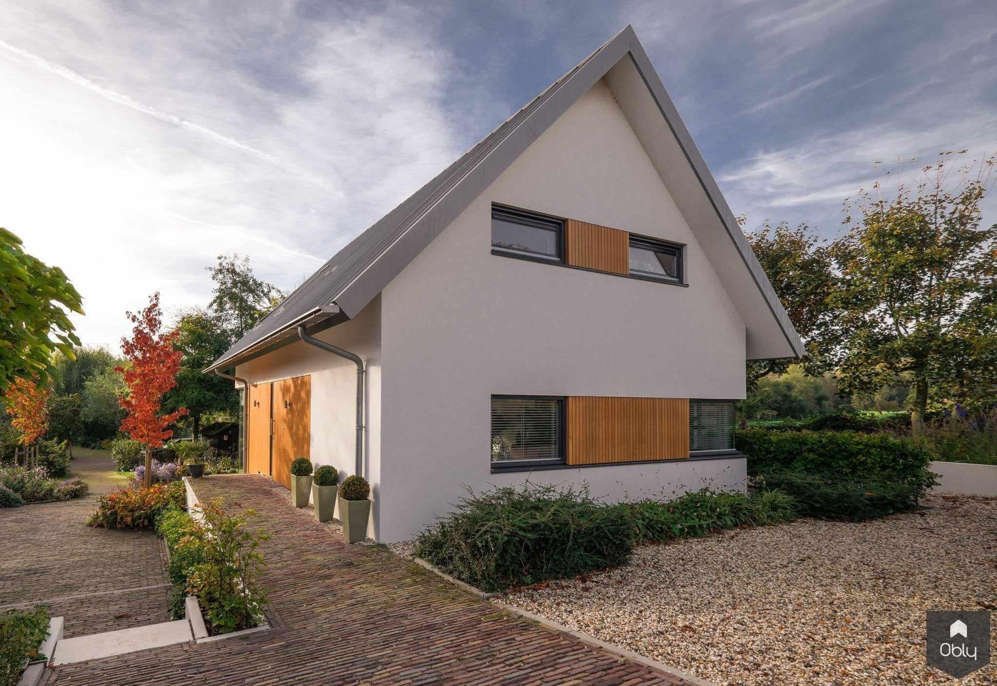 Nieuwbouw dijkwoning met split level-Van Os Architecten-alle,dijkwoning,Exterieur,Exterieur vrijstaand,grote tuin,hoogteverschil,moderne architectuur,split level woning,verticale houten gevel-OBLY