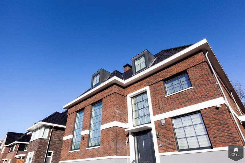 Splitlevel villa met maatwerk inrichting-Dineke Dijk-alle,Woonkamer-OBLY