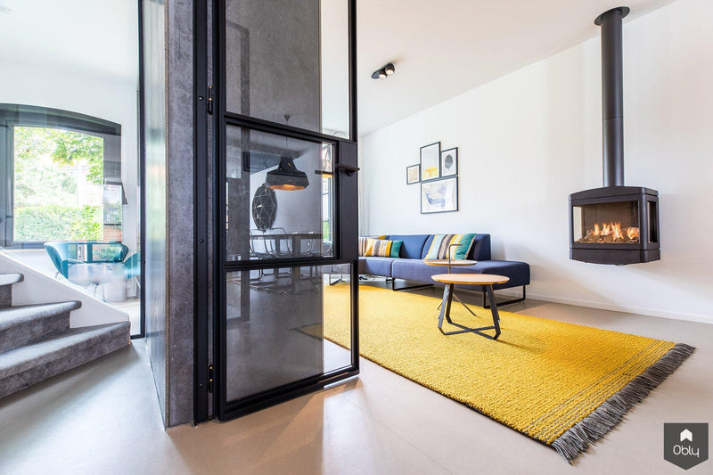 Stadse jaren ’50 hoekwoning met allure van moderne villa-StrandNL architectuur en interieur-alle,Woonkamer-OBLY