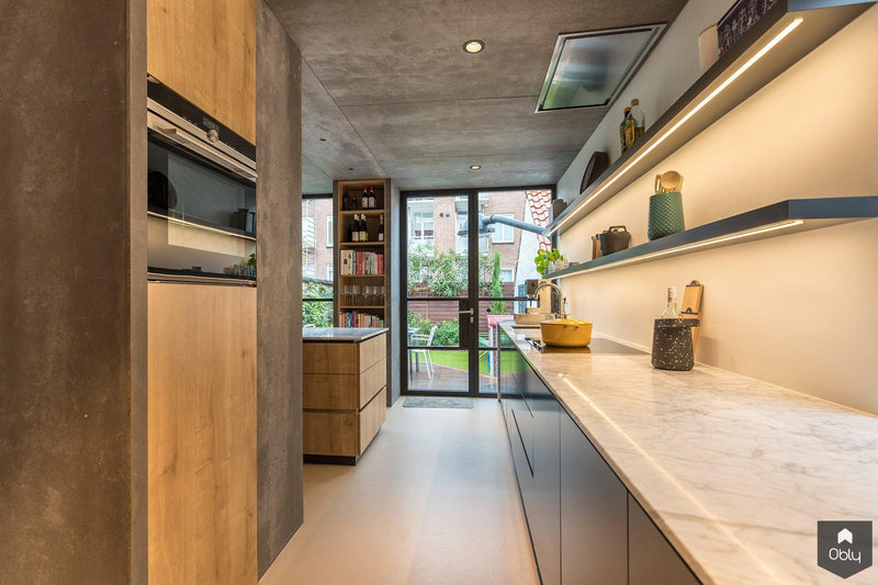 Stadse jaren ’50 hoekwoning met allure van moderne villa-StrandNL architectuur en interieur-alle,Woonkamer-OBLY
