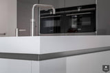 Strak Corian werkblad met verlijmde stollenwand-Cora Techniek-alle,Keuken-Strak Corian werkblad met verlijmde stollenwand | OBLY.com-OBLY