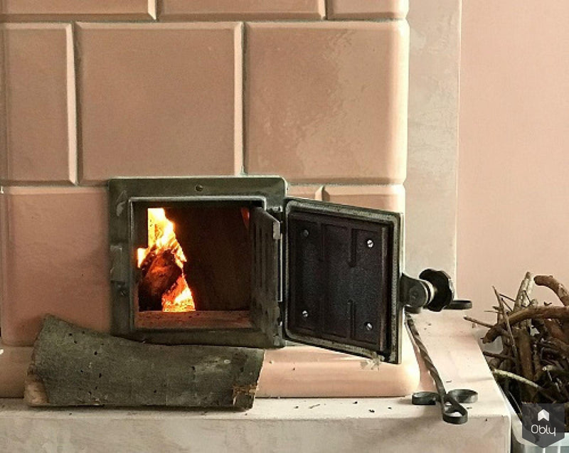 Tegelkachel in woonkamer met leemverf-Gloed Tegelkachels-alle,Woonkamer-OBLY