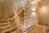 Trappen met stalen middenboom-Van Bruchem Staircases-alle,Entree hal trap-OBLY