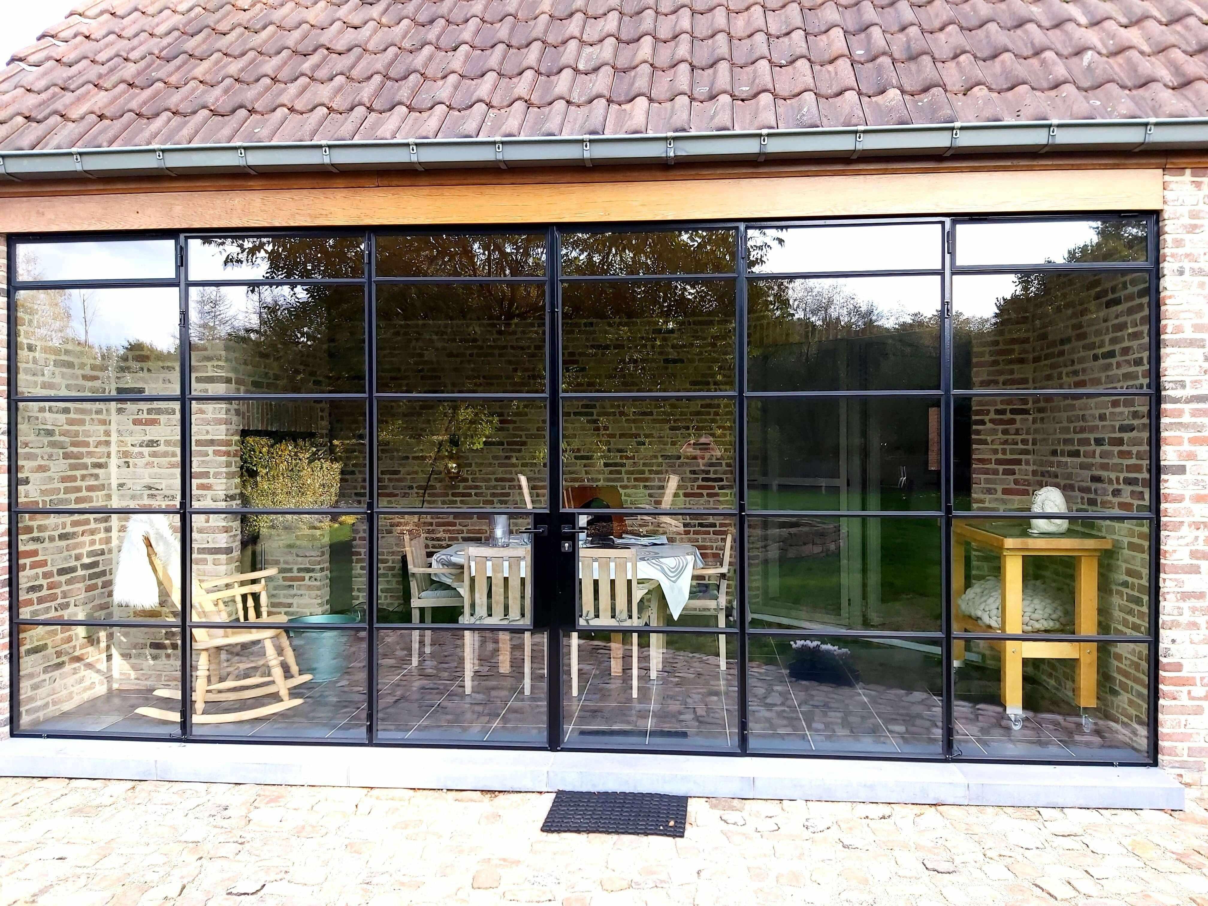 Ultra ranke stalen vouwdeuren maatwerk-Stalendeurenhuys-aanbouw,glazen vouwwanden,luxe aanbouw met glas,maatwerk stalen vouwwand,ranke stalen profielen,stalen pui op maat,stalen serre deuren,ultra ranke stalen vouwdeuren,winddichte vouwdeuren-Ultra ranke stalen maatwerk vouwdeuren -OBLY