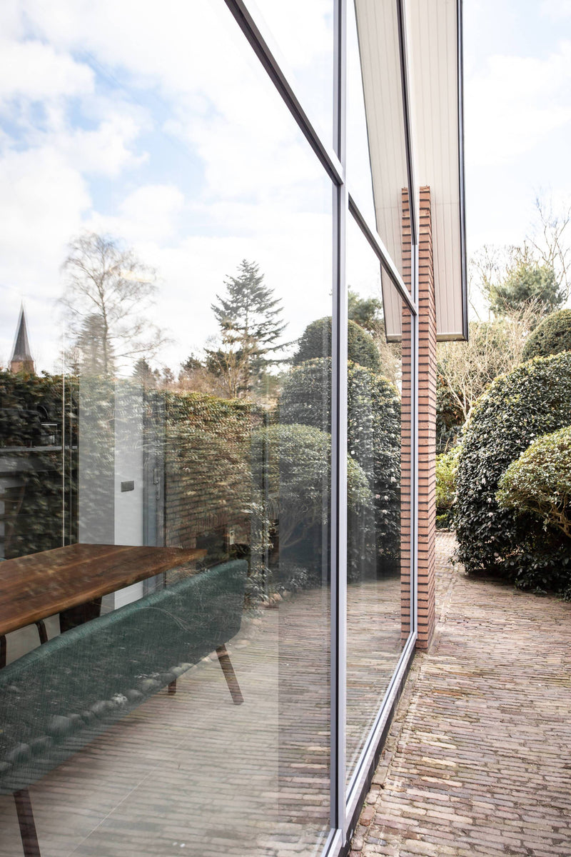 Verbouwing woning jaren 70-Bob Romijnders Architectuur - Interieur-Woonkamer-Omgebouwde jaren 70-woning-OBLY
