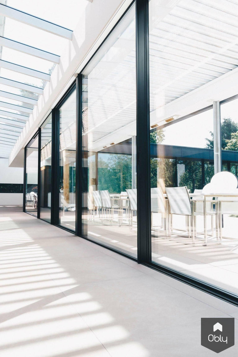 Villa met zwarte glazen wanden-KELLER minimal windows® by Kumasol-alle,Exterieur vrijstaand,Vrijstaand-Villa met zwarte glazen wanden | OBLY.com-OBLY