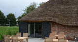 Vlaamse schuur als B&B met rieten dak en bakstenen gevel-Architectenbureau Drijvers Oisterwijk B.V.-alle,B&B,bakstenen gevel,Exterieur vrijstaand,gastenverblijf,landelijke architectuur,rieten dak,Vlaamse schuur-Vlaamse schuur als B&B met rieten dak | Drijvers-OBLY