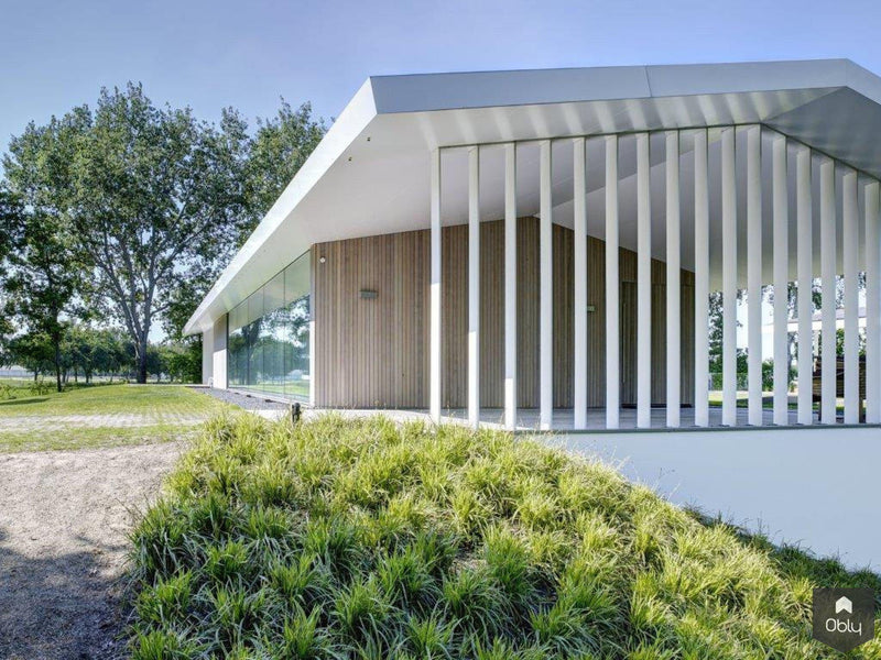 Waterdoorlatende tuin bij villa-Kamsteeg Tuinen-alle,Tuinen-OBLY